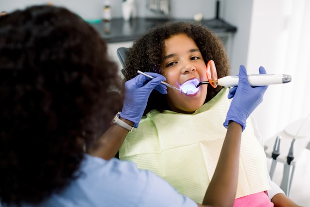 Tooth-colored composite filling restoration for a child at Coastal Kids Dentistry